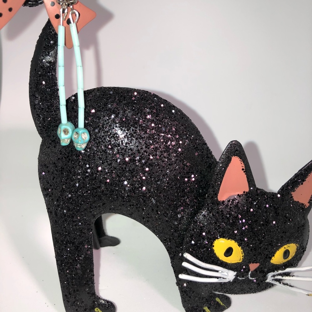 Star Crafts Blue Skull Earrings